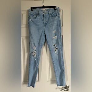Levi’s distressed 720 high rise super skinny jeans